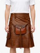 Brown leather Kilt with a front pocket and gold buttons on a white background