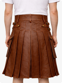 Brown leather skirt worn by a person on a white background