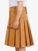 Camel kilt with decorative studs on a white background