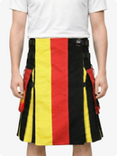 Person wearing a colorful striped kilt with red, yellow, and black stripes on a white background.
