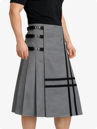 Gray skirt with black accents worn by a person on a white background