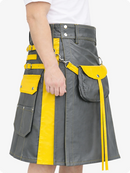 Gray kilt with yellow accents worn by a person on a white background