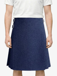 Person wearing a navy blue skirt on a white background