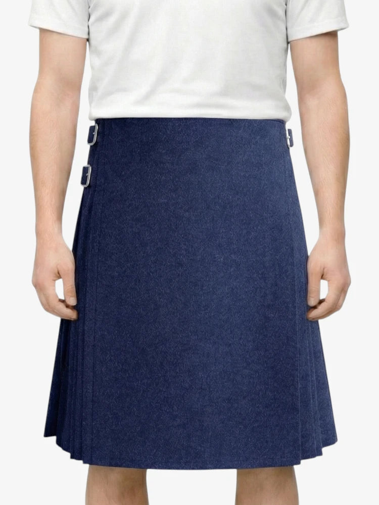 Person wearing a navy blue skirt on a white background