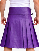 Purple pleated skirt worn by a person on a white background