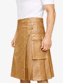 Tan leather skirt with gold chain detail on a white background