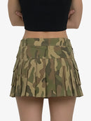 Camouflage skirt worn by a person on a white background